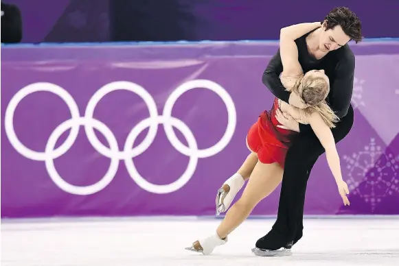  ?? ARIS MESSINIS/AFP/GETTY IMAGES ?? Quebec’s Julianne Seguin and Charlie Bilodeau compete in pairs free skating at the Gangneung Ice Arena.