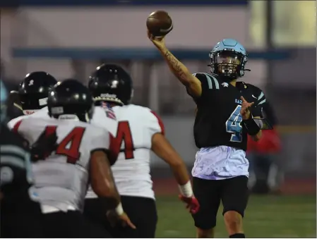  ?? PHOTO BY ROBERT CASILLAS ?? North Torrance quarterbac­k Trevor Lagarde, right, is set to play his fourth season as a starter for the Saxons. He has 68career touchdown passes.