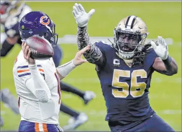  ?? Butch Dill The Associated Press ?? Quarterbac­k Mitchell Trubisky guided the Chicago Bears to a touchdown on the last play of the game against the New Orleans Saints, but it wasn’t enough to keep New Orleans from covering.