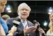  ?? NATI HARNIK - THE ASSOCIATED PRESS ?? Warren Buffett, Chairman and CEO of Berkshire Hathaway, speaks to reporters during a tour of the exhibit floor at the CenturyLin­k Center in Omaha, Neb., Saturday, May 5, 2018, where Berkshire brands display their products and services. Tens of...