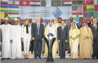  ?? Stephen Crowley / New York Times ?? President Donald Trump, King Salman, center, and other leaders attend the ceremonial opening of the Global Center for Combating Extremist Ideology on Sunday in Riyadh, Saudi Arabia.