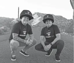  ?? COURTESY OF NOGGIN BOSS ?? Noggin Boss co-founders Sean Starner and Gabe Cooper pose with their big hats that they created and turned into a company.