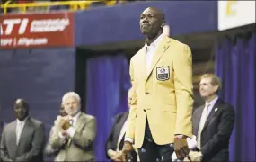  ?? Mark Humphrey / Associated Press ?? Former wide receiver Terrell Owens is applauded after he was given his Pro Football Hall of Fame coat on Saturday in Chattanoog­a, Tenn.