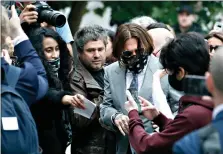  ?? (AP Photo/Alastair Grant) ?? Actor Johnny Depp, center, is surrounded by fans as he arrives Thursday at the High Court in London. Depp is suing News Group Newspapers, publisher of The Sun, and the paper’s executive editor, Dan Wootton, over an April 2018 article that called him a “wife-beater.” The Sun’s defense relies on a total of 14 allegation­s by his ex-wife Amber Heard of Depp’s violence. He strongly denies all of them.