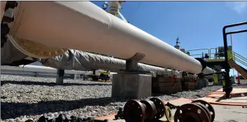  ?? Dale G YounG/DetroIt neWs VIa aP ?? In this 2017 file photo, fresh nuts, bolts and fittings are ready to be added to the east leg of the pipeline near St. Ignace as Enbridge prepares to test the east and west sides of the Line 5 pipeline under the Straits of Mackinac in Mackinaw City, Mich.