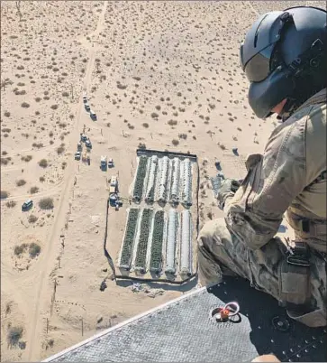  ?? U.S. Drug Enforcemen­t Administra­tion ?? AN AERIAL VIEW shows an illegal marijuana grow in the Antelope Valley. “There’s more black-market marijuana than ever before, much more than prior to Prop. 64,” said one federal drug enforcemen­t agent.