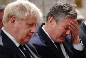  ?? AFP ?? Asistieron al acto el premier Boris Johnson (izq.) y el principal líder opositor del Partido Laborista británico, Keir Starmer.