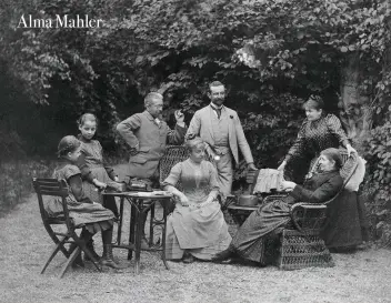  ??  ?? Alma’s lost family: a gathering with her father Emil Schindler (third from the left) and mother Anna (standing on the right), with Alma and her sister Gretl on the left