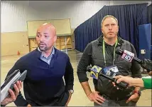  ?? D. ORLANDO LEDBETTER/DLEDBETTER@AJC.COM ?? Falcons general manager Terry Fontenot (left) and head coach Arthur Smith discuss the team’s offseason plans at the NFL scouting combine.