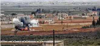  ?? Aamaq News Agency via Associated Press ?? An image from militant video posted online by a media arm of the Islamic State group on Monday purports to show the moment of a Turkish missile strike in al-Bab, Syria.