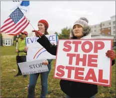  ?? AP photo ?? Supporters of President Donald Trump gather outside of the Wyndham Hotel where the Pennsylvan­ia State Senate Majority Policy Committee is scheduled to meet Wednesday in Gettysburg, Pa.