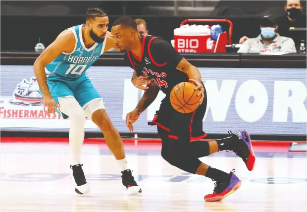  ?? KIM KLEMENT / USA TODAY SPORTS ?? Raptors guard Norman Powell had 24 points in a win over Caleb Martin and the Hornets on Saturday night.