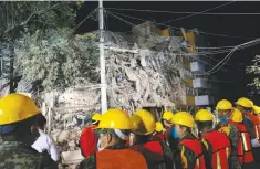  ??  ?? RESCUERS work at the site of a collapsed building after an earthquake in Mexico City, Mexico Sept. 20.