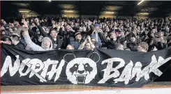  ??  ?? You can bank on us Saints fans take over Tannadice