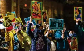  ?? STEVE SCHAEFER FOR THE AJC 2022 ?? Attendees protest March 16 in Atlanta at an Asian Justice rally one year after the spa shootings. Six victims were Asian American women, and Fulton DA Fani Willis is seeking a harsher sentence for the shooter under a hate crimes law.