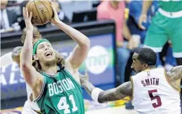  ?? AP FILE ?? New Heat acquisitio­n Kelly Olynyk, left, “is a little bit under-viewed because he looks like a surfer,” Heat center Hassan Whiteside says.