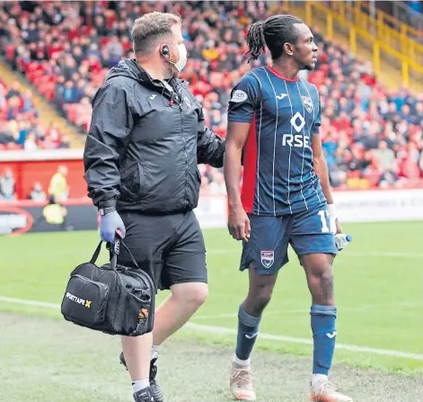  ??  ?? INJURED: Staggies goalscorer Regan Charles-Cook leaves the pitch after tweaking his hamstring against Aberdeen.