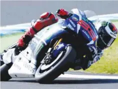  ?? — AFP ?? MOTEGI: Movistar Yamaha MotoGP’s Spanish rider Jorge Lorenzo drives his motorcycle during the MotoGP-class second free practice session at the Japanese Grand Prix in the Twin Ring Motegi circuit.