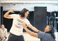  ?? THE CANADIAN PRESS ?? Actors Ujarneq Fleischer (left) and Johnny Issaluk rehearse a scene for the “The Breathing Hole” in Stratford, Ont., June 15, 2017.