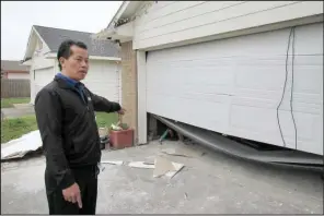  ?? (AP/Juan Lozano) ?? Houston resident Quan Nguyen talks last month about the damage to his home after the Jan. 24 explosion at a nearby industrial business.