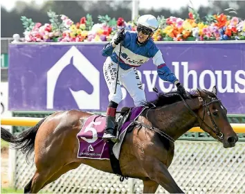  ?? PHOTO: GETTY IMAGES ?? Sam Spratt salutes the first leg of her feature double at Riccarton on Saturday.