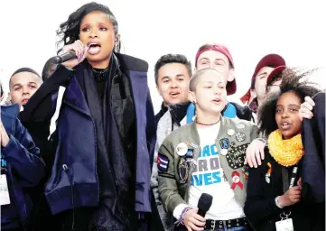  ??  ?? Singer Jennifer Hudson performs alongside Emma Gonzalez (2nd from Right), Marjory Stoneman of Douglas High School in Parkland, Florida, and 11-year-old Naomi Wadler of Alexandria, Virginia (Right) at the conclusion of the “March for Our Lives” event demanding gun control after recent school shootings at a rally in Washington, US, Saturday.