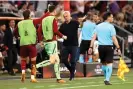  ?? Photograph: Naomi Baker/Getty Images ?? José Mourinho gestures for his team to keep their cool after opening the scoring.