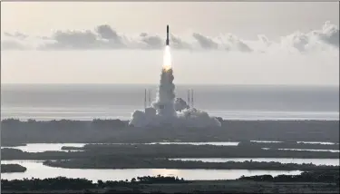  ?? JOE BURBANK/ORLANDO SENTINEL/TNS ?? The United Launch Alliance Atlas 5rocket carrying the Mars 2020rover lifts off from Launch Complex 41at Cape Canaveral Air Force Station, Fla., July 30.