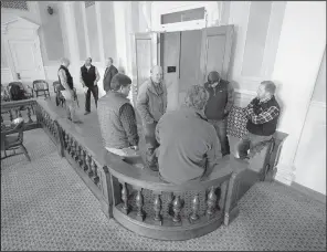  ?? Arkansas Democrat-Gazette/STATON BREIDENTHA­L ?? Farmers gather Tuesday in the Old Supreme Court room at the state Capitol before a news conference about proposed rules for the use of the herbicide dicamba.