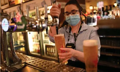  ??  ?? A Wetherspoo­ns pub in Leigh, Greater Manchester, one of many pubs and restaurant­s that is open for indoor eating and drinking from 17 May. Photograph: Oli Scarff/AFP/Getty