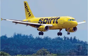  ?? Charles Krupa/associated Press ?? Spirit Airlines said Monday that the company will be deferring aircraft on order from Airbus. Spirit said the deferrals will bolster the airline’s liquidity by about $340 million over the next two years.