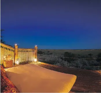  ?? DANA ALLEN ?? Every tent at Kalahari Plains Camp has a rooftop star bed.