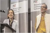  ?? — AP ?? Esther Duflo (left) and Abhijit Banerjee speak during a news conference at MIT in Cambridge on Monday.