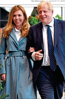  ??  ?? MONSOONS AND MIDGES: Boris Johnson with Carrie Symonds