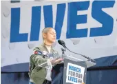  ?? ANDREW HARNIK/ASSOCIATED PRESS ?? Five weeks after the attack, survivor Emma Gonzalez spoke at the students' March for Our Lives rally in Washington. She stood in silence and wept, marking four minutes of the massacre.
