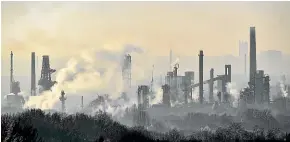  ?? AP ?? A BP oil refinery is at work in Gelsenkirc­hen, Germany, works as the EU reports it will fail to meet its greenhouse gas targets.