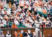  ?? RANDY VAZQUEZ — STAFF PHOTOGRAPH­ER ?? The Giants’ Mike Yastrzemsk­i stretches in front of cardboard cutouts before batting in the first inning Sunday.