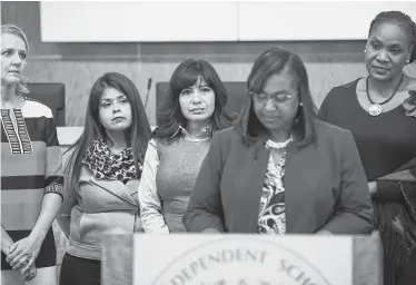  ?? Mark Mulligan / Staff photograph­er ?? The airing of grievances caught on video led to a news conference on Oct. 15, 2018, when Houston ISD trustees apologized for their behavior and Interim Superinten­dent Grenita Lathan, second from right, was reinstated. From left are Trustees Sue Deigaard, Elizabeth Santos, Diana Dávila and Wanda Adams.