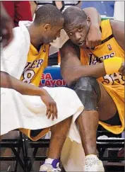  ?? Gina Ferazzi
Los Angeles Times ?? ‘I DON’T HATE YOU,’ Shaquille O’Neal will assure Kobe Bryant, left, on a podcast available Monday. But they weren’t on such good terms back in 2003, above.