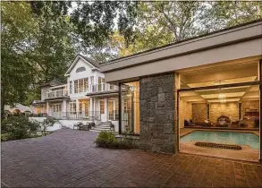  ?? Michelle&Team / Contribute­d photo ?? The compound at 157 Easton Road in Westport, nicknamed "The River Run" is set along the Aspetuck River and includes a main house, guest house and river house.