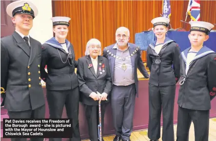  ??  ?? Pat Davies receives the Freedom of the Borough award – she is pictured with the Mayor of Hounslow and Chiswick Sea Cadets