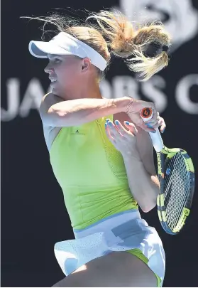 ?? Picture: AFP ?? GRITTY. Denmark’s Caroline Wozniacki was made to dig deep against Croatian Jana Fett during their second round match at the Australian Open in Melbourne yesterday.