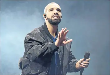  ?? THE ASSOCIATED PRESS FILES ?? Drake, seen performing in Toronto last October, could win Juno awards for his single One Dance. The awards show airs Sunday on CTV, live from Ottawa’s Canadian Tire Centre.