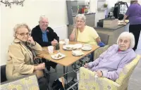  ??  ?? ●●Residents enjoying socialisin­g at the borough’s new dementia hub