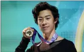  ?? JOHN LOCHER — THE ASSOCIATED PRESS ?? Nathan Chen shows off his medal at the U.S. Figure Skating Championsh­ips Jan. 17in Las Vegas.