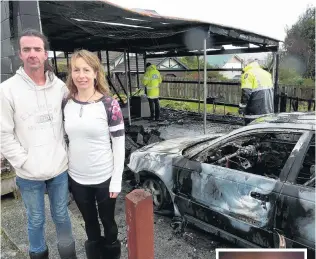  ?? PHOTOS: RICHARD DAVISON/SUPPLIED ?? Gutted . . . Balclutha couple Glenn Burns and Giselle Cooper take stock of the damage after a fire destroyed their Lewin St garage and two vehicles early yesterday morning. Right: The garage shortly after emergency services were called about 12.30am...