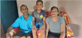  ?? Gideon with his parents at home in Labasa. ??