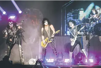  ?? Photo — AFP file ?? Members of the US rock music band Kiss (from left) Gene Simmons aka The Demon, Paul Stanley aka The Starchild, perform during the Hellfest Summer Open Air rock festival in Clisson, western France, on June 15, 2023.