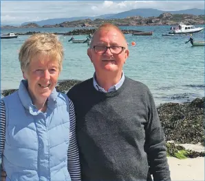  ??  ?? Murdo with Jane - and Redbay RIB ‘Achnaba’ moored in the background.