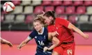  ?? Photograph: Shinji Akagi/AFP/Getty Images ?? Team GB’s Leah Williamson (left) and Canada’s defender Vanessa Gilles contest a header.